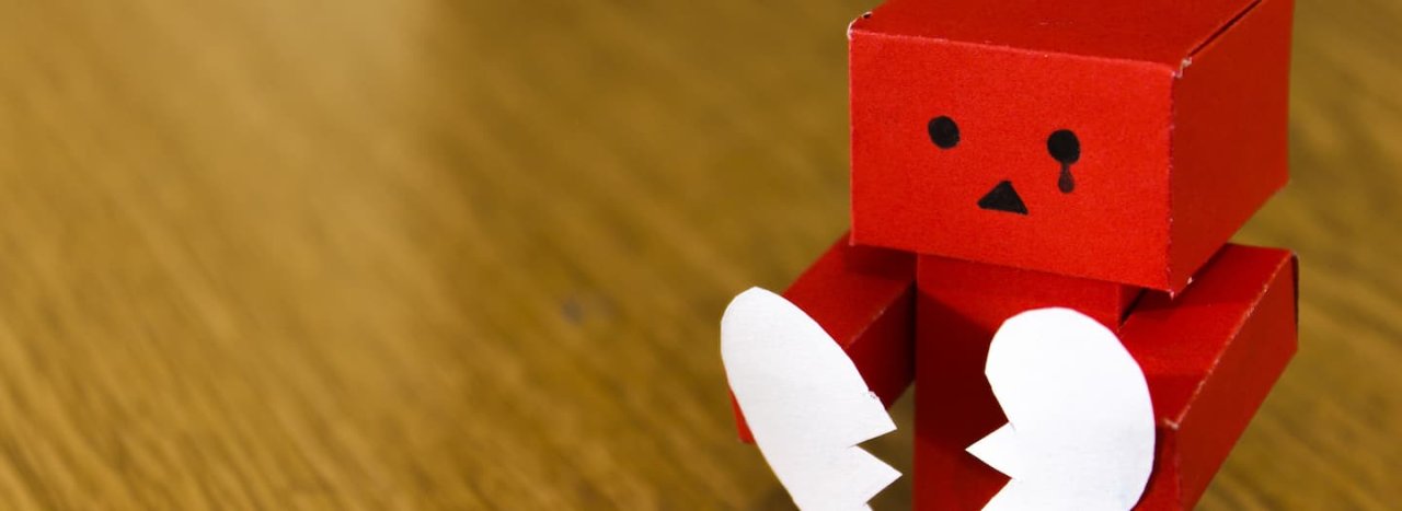 An emotionally distressed cardboard model and a broken heart representing All Nation's course on Vulnerable Children: Biblical and Theological Perspectives.