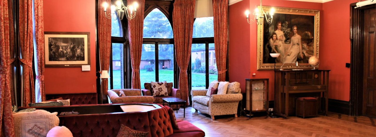A view of the lounge at All Nations college, representing years of history and the forming of the college.