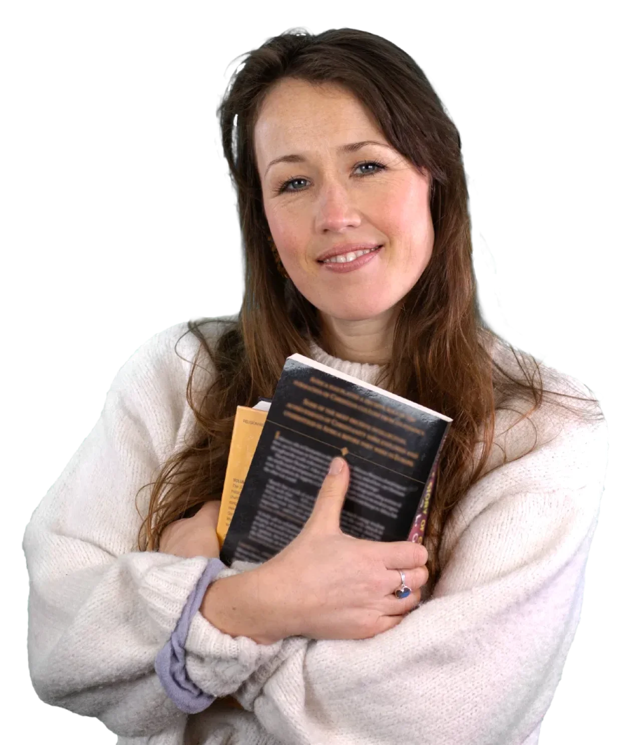 A student from All Nations holding a few books, representing biblical studies at All Nations college in the UK.